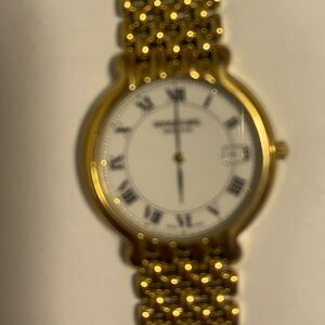 Raymond Weil men’s gold plated automatic watch.